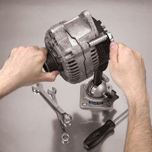 Working on an engine part supported by the PanaVise 400 heavy duty base