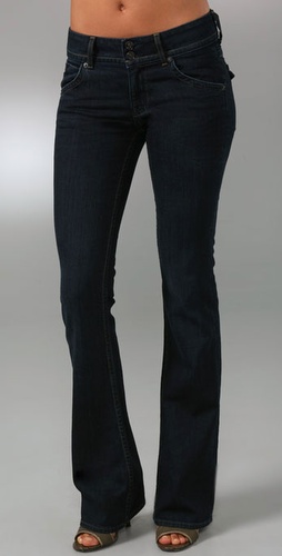 These dark-wash boot-cut jeans feature 5-pocket styling and a double-button 