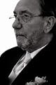Arnold J Inzko