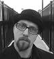 J. Travis Grundon