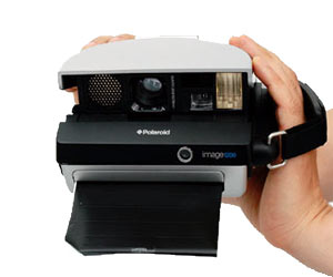 Spectra camera with frog tongue