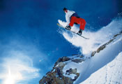 Snowboarder jumping