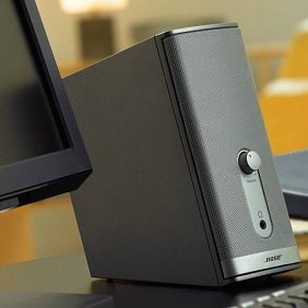 Volume control and headphone jack are conveniently located on the powered speaker.