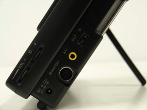 Locate monitor port on the side-panel of AXN-6979&rsquo;s main unit