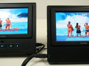After DIN cable connection, DVD movie will display on both monitors of AXN-6979
