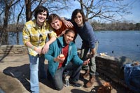 friends posing by the riverside