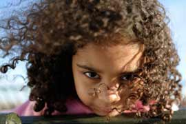 photo of girl with brown curly hair