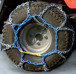 The König Rallye NR snow chain installed on a working vehicle