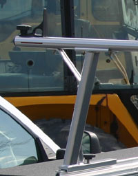 An isolated view of a TracRac 28101 silver 22-inch tall utility rack support with load stop showing