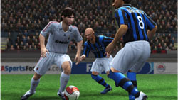 Breaking a double team at mid-field in 'FIFA Soccer 09' for PS2