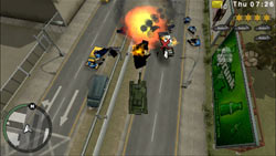 Using a Liberty City Rhino Tank against enemies in Grand Theft Auto: Chinatown Wars for PSP
