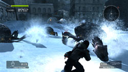 Battling the Akrid in the deep snow in 'Lost Planet: Extreme Condition - Colonies Edition'