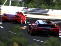 Two Ferraris playing follow the leader around a tight turn in Gran Turismo 5