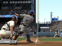 A right-handed batter lining a shot at a third baseman in MLB 11: The Show