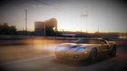 Car speeding solo down a course at sunset in 'Blur'