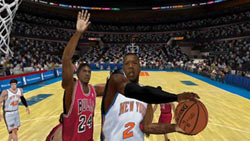 Knicks player cutting to the hoop with the Bulls in pursuit in NBA 2K10 Knicks player cutting to the hoop with the Bulls in pursuit in NBA 2K10