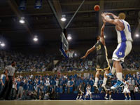 Duke player getting a 3-pointer off over a Wake Forest defender in NCAA Basketball 10 Duke player getting a 3-pointer off over a Wake Forest defender in NCAA Basketball 10