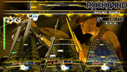 A drummer keeping the rhythm section together in Rock Band Track Pack: Volume 2
