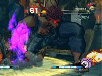 Evil Ryu finishing Akuma with a combo in Super Street Fighter IV: Arcade Edition