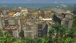 Looking out on a city of Tropico from the jungle in Tropico 3