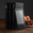 Kindle leaning against books