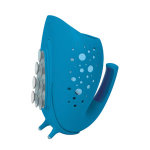 The OXO Tot Whale Pail has a suction cup wall holder to firmly attach it to a smooth tiled surface