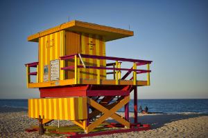 Picture shows a lifeguard's brightly coloured beach hut on a Florida, USA beach.