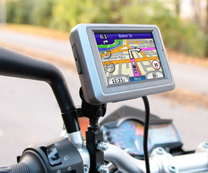 This affordable, compact motorcycle navigator mounts neatly on your bars, ready to guide your ride with spoken street names sent wirelessly to your Bluetooth®-enabled helmet or headset.