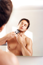 Shaving in mirror