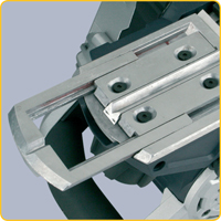 The shoe extension assists in guiding the planer for improved control at the start of the cut.