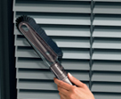 Using the soft dusting brush