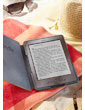 Kindle eReader: Lesen wie auf echtem Papier, selbst bei hellem Sonnenlicht _ Kindle auf einem Strandtuch
